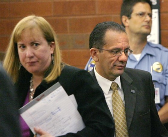Hartford Mayor Eddie Perez, center, faces up to 60 years in prison after his conviction on five corruption charges.